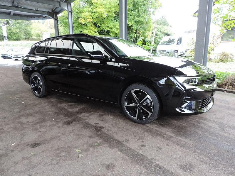 Karbon schwarz metallic Gebraucht 2024 Opel Astra Kombi | 24.490 € (Guter Preis) - Bild 1/4
