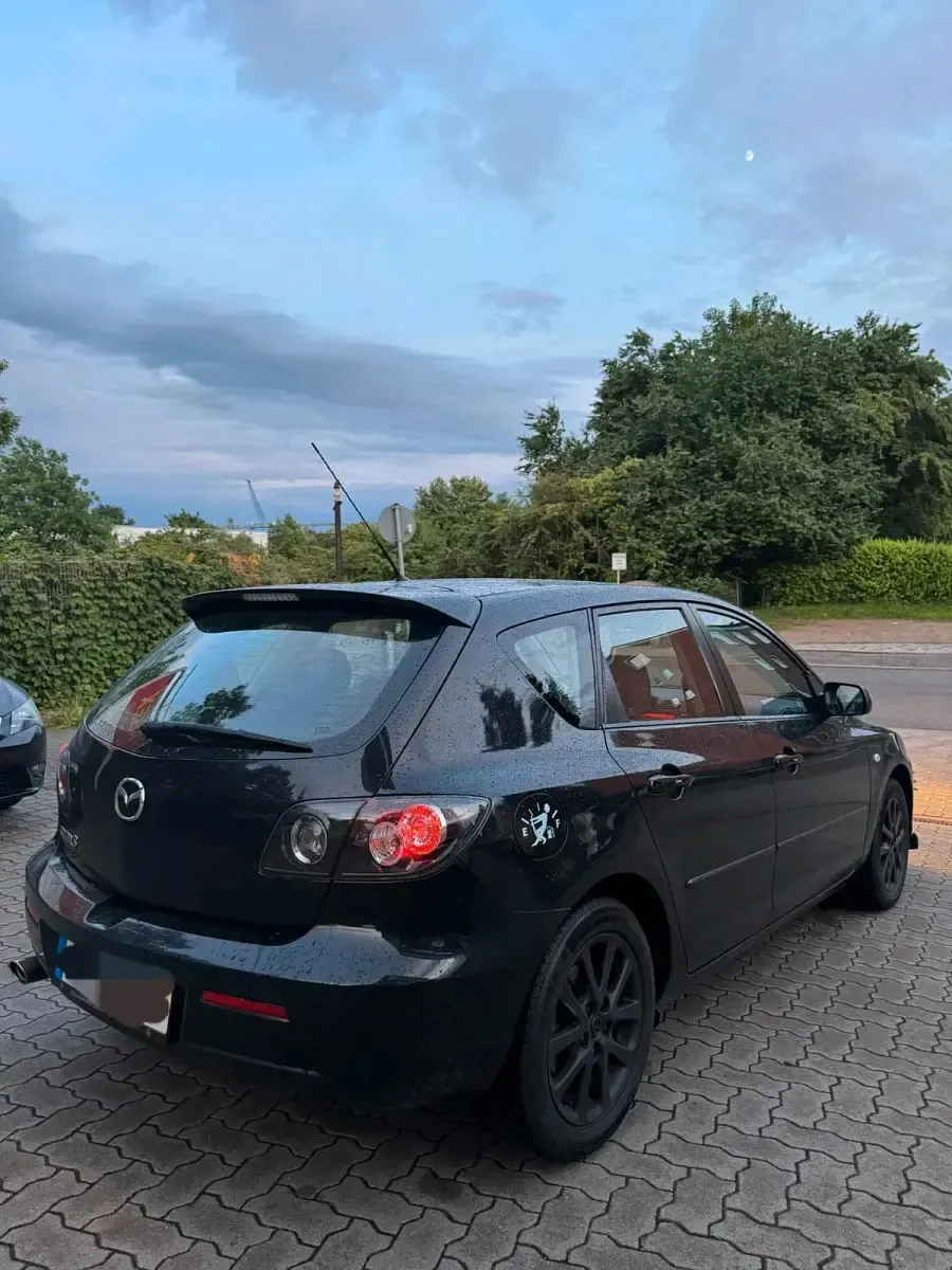 Używany Mazda 3 105 KM (77 kW) 2008 Czarny Hatchback