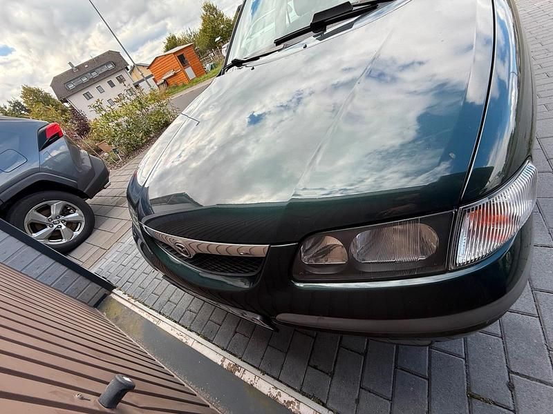 Grün Gebraucht 1998 Mazda 626 Limousine | 1.250 € - Bild 1/4