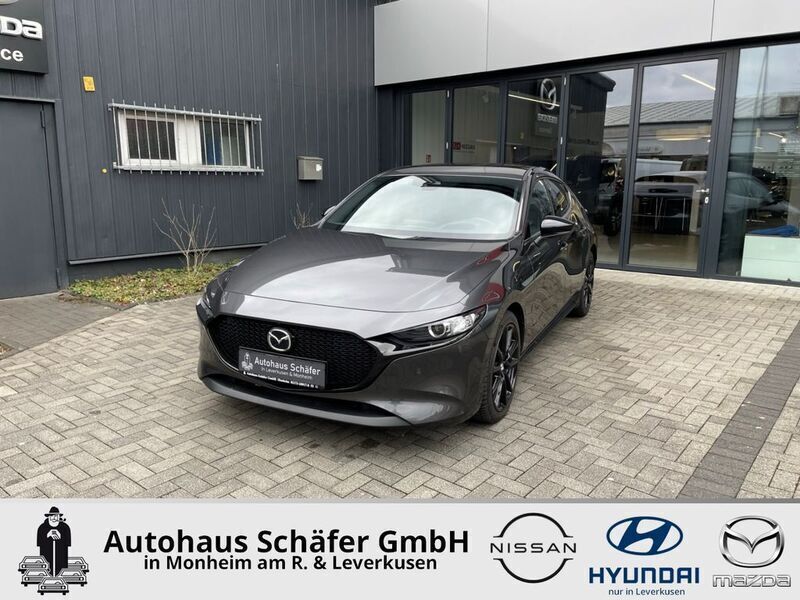 Machine grey Gebraucht 2022 Mazda 3 Homura-Line Limousine | 22.335 € (Guter Preis) - Bild 1/4