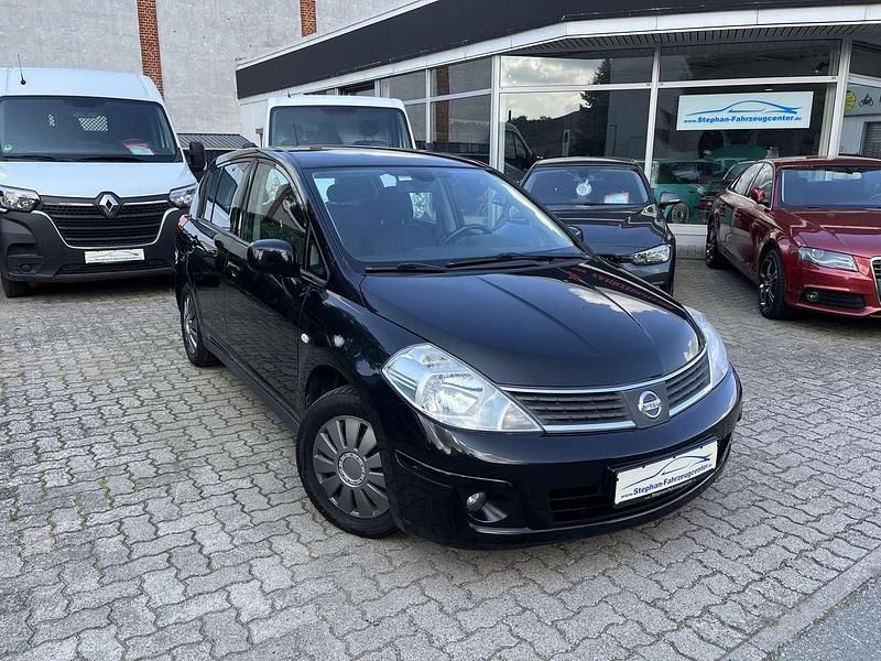 Super black Gebraucht 2009 Nissan Tiida Acenta Kleinwagen | 3.990 € (Fairer Preis) - Bild 1/4