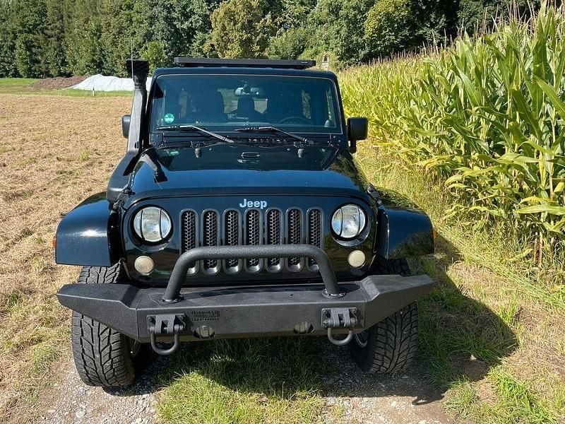 Schwarz Gebraucht 2013 Jeep Wrangler Sahara SUV | 22.999 € (Fairer Preis) - Bild 1/4