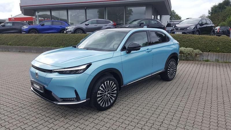 Blau Neu 2024 Honda e:Ny1 Advance SUV | 36.990 € (Fairer Preis) - Bild 1/4