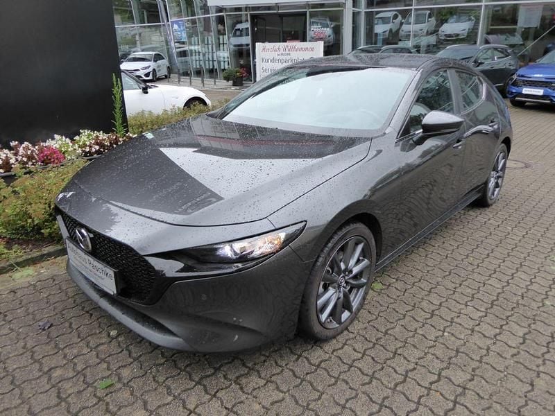 Grau Gebraucht 2021 Mazda 3 Selection Limousine | 21.990 € (Fairer Preis) - Bild 1/4