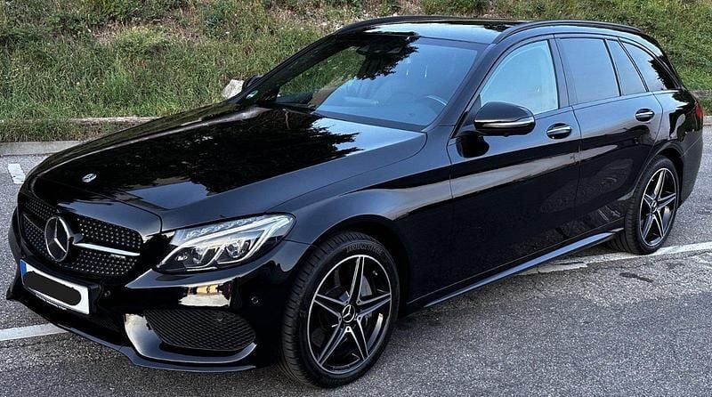 Schwarz Gebraucht 2016 Mercedes C250 AMG line Kombi | 23.999 € (Teuer) - Bild 1/4