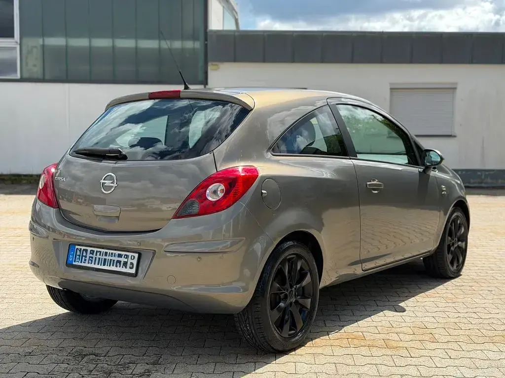 Gebraucht Opel Corsa Active 87 PS (63 kW) 2013 Braun Kleinwagen