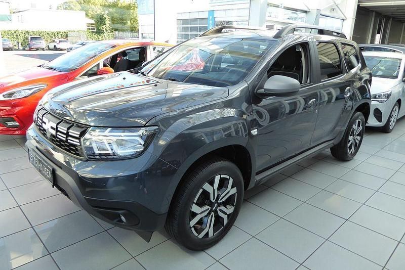 Grau Gebraucht 2023 Dacia Duster SUV | 16.990 € (Fairer Preis) - Bild 1/4