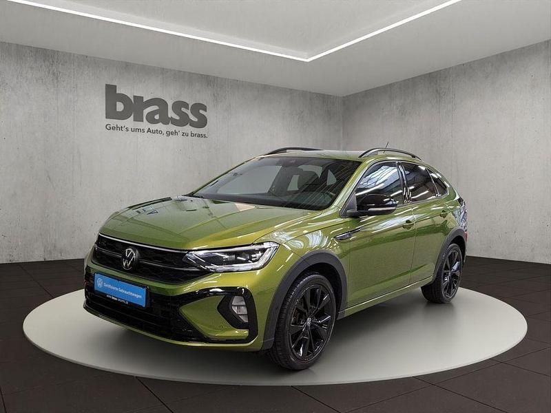 Visual green metallic Gebraucht 2022 VW Taigo R-line SUV | 23.450 € (Fairer Preis) - Bild 1/4