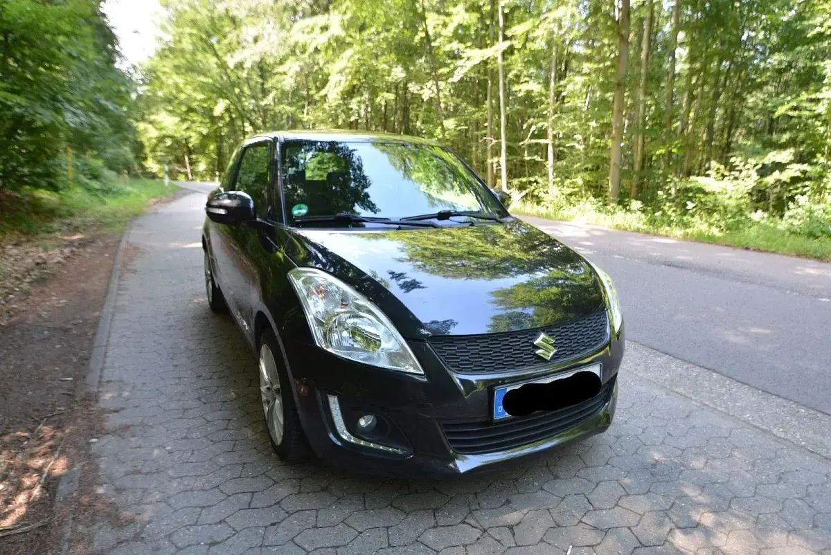 Gebraucht Suzuki Swift Comfort 94 PS (69 kW) 2014 Schwarz Kleinwagen