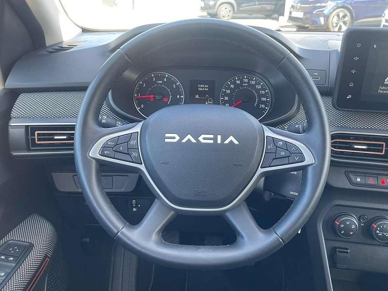 Gebraucht Dacia Sandero Expression 91 PS (66 kW) 2023 Taklamakanorange metallic Kleinwagen