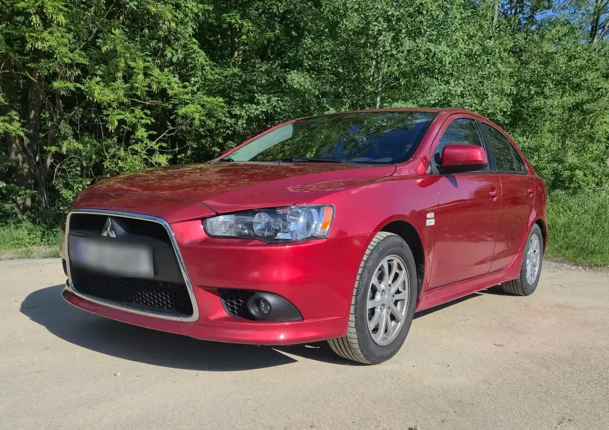 Gebraucht Mitsubishi Lancer 143 PS (105 kW) 2010 Rot Limousine