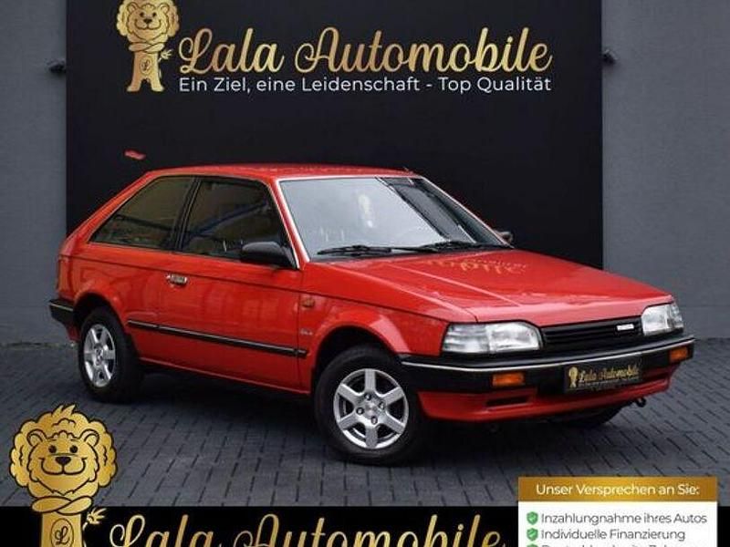 Rot Gebraucht 1988 Mazda 323 Kleinwagen | 5.980 € - Bild 1/4