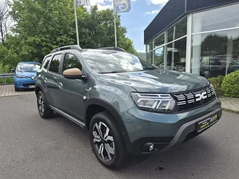 Second-hand Dacia Duster Extreme 150 CP (110 kW) 2023 Portocaliu SUV