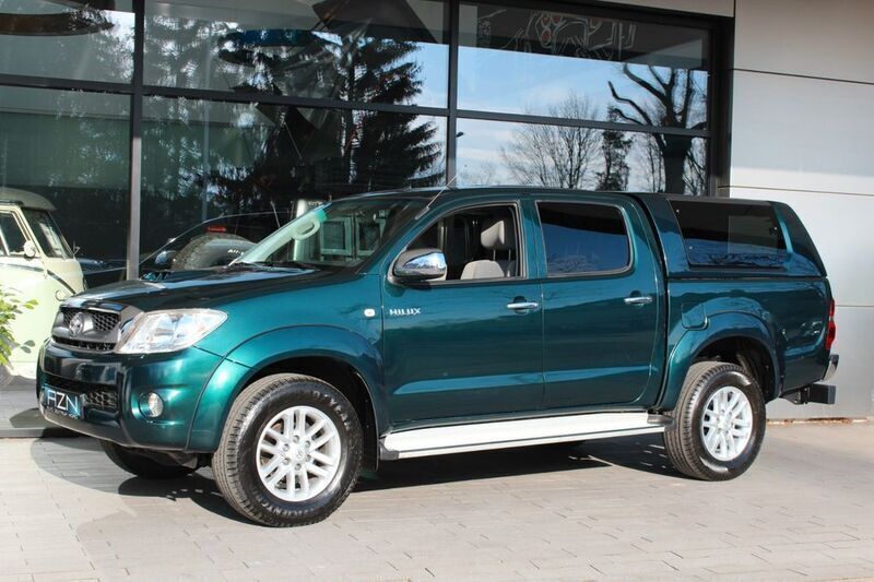 Dark green mica metallic Gebraucht 2011 Toyota HiLux Abholung | 25.900 € - Bild 1/4