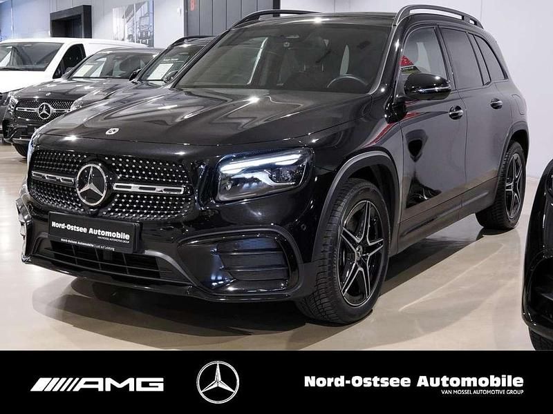 Metalliclack kosmosschwarz Gebraucht 2024 Mercedes GLB220 AMG SUV | 46.690 € (Fairer Preis) - Bild 1/4