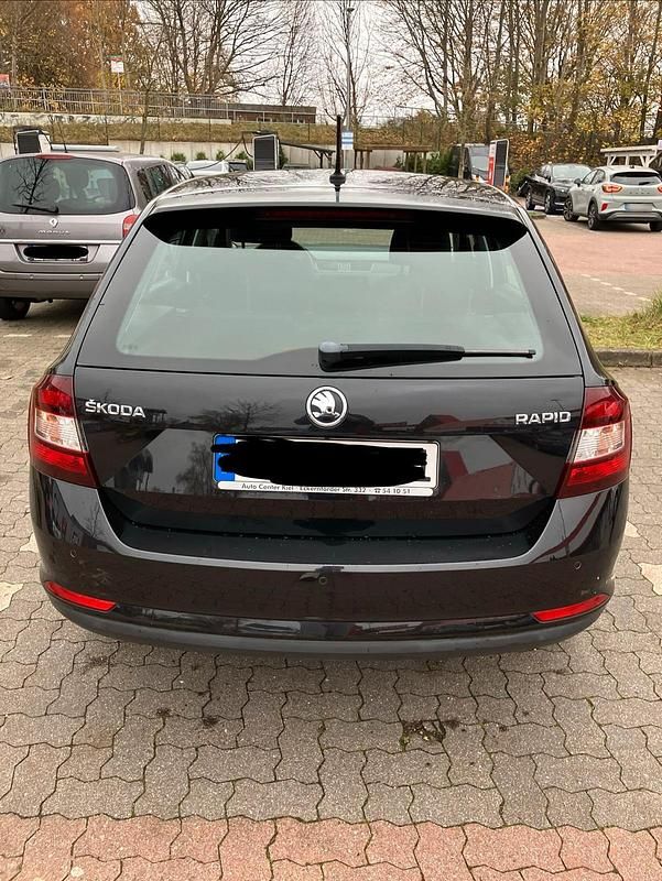 Używany Skoda Rapid 110 KM (80 kW) 2013 Czarny Hatchback