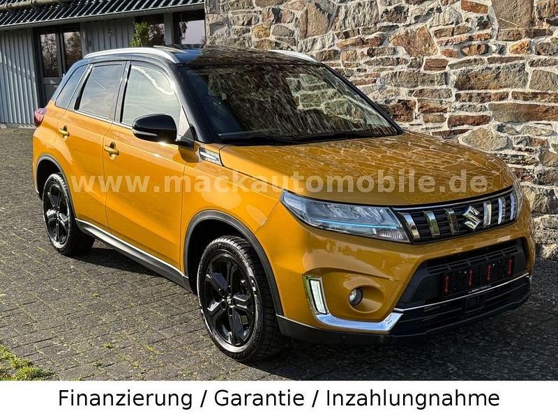 Orange Gebraucht 2021 Suzuki Vitara Comfort SUV | 19.990 € (Fairer Preis) - Bild 1/2