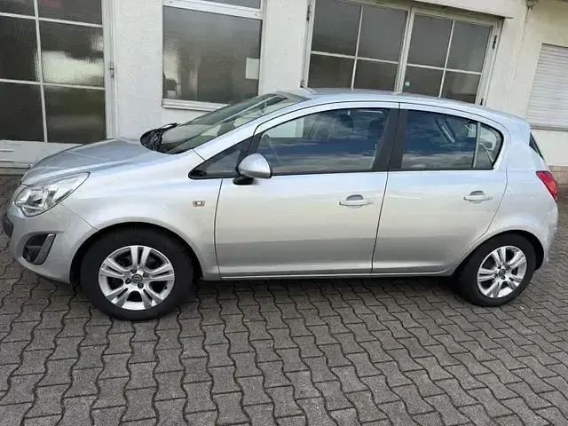 Gebraucht Opel Corsa Active 90 PS (66 kW) 2013 Silber Kleinwagen