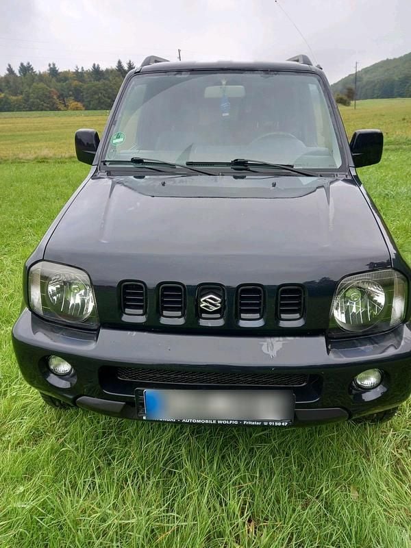 Schwarz Gebraucht 2002 Suzuki Jimny SUV | 4.990 € (Fairer Preis) - Bild 1/4