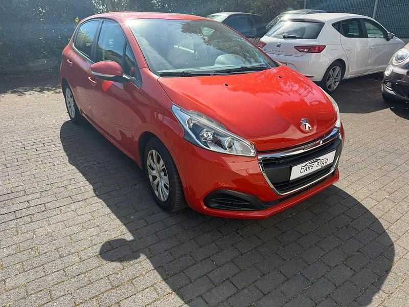 Gebraucht Peugeot 208 82 PS (60 kW) 2015 Orange Kleinwagen