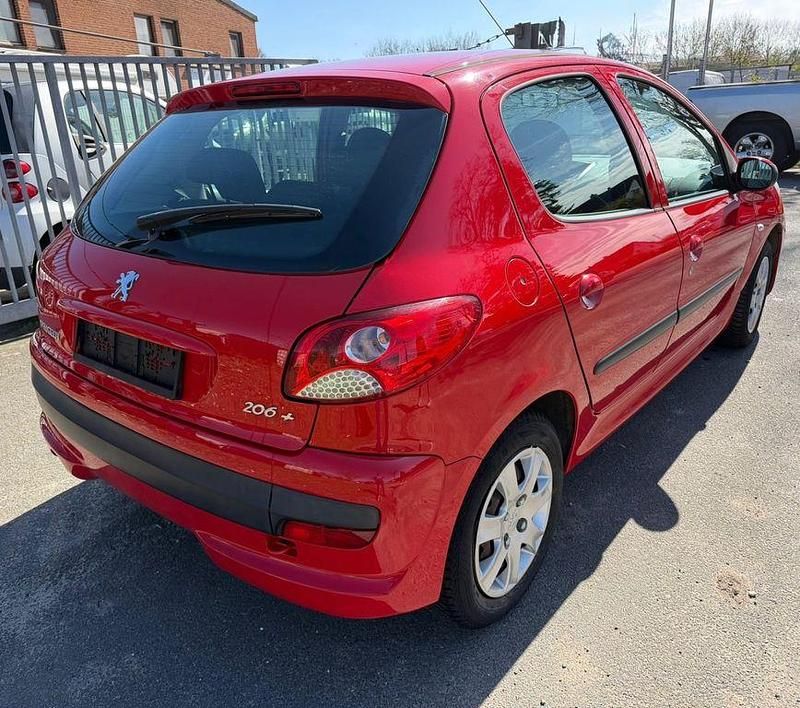 Usado Peugeot 206 Basis 75 HP (55 kW) 2009 Vermelho Sedan