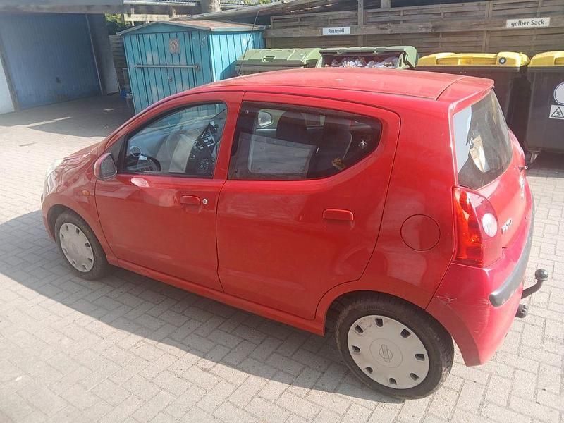 Gebraucht Nissan Pixo Acenta 68 PS (50 kW) 2009 Rot Kleinwagen