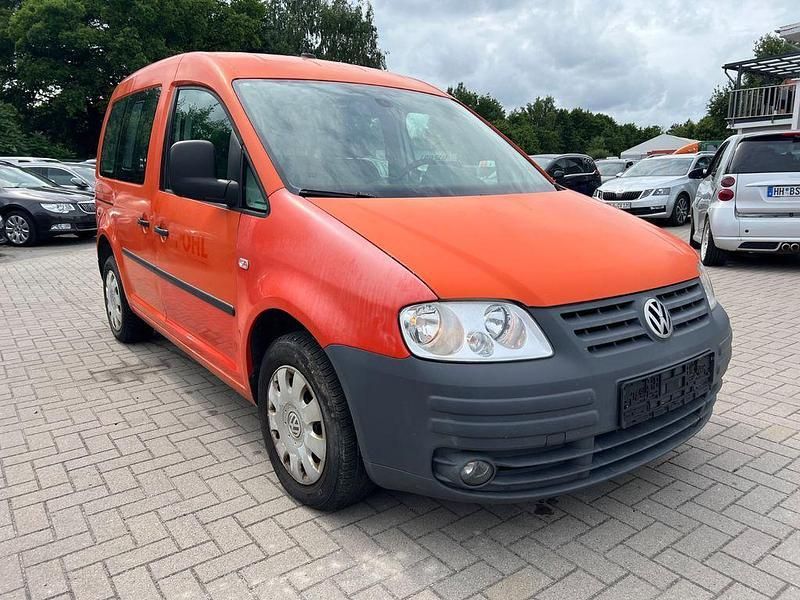 Gebraucht VW Caddy Team 105 PS (77 kW) 2010 Orange Van / Kleinbus