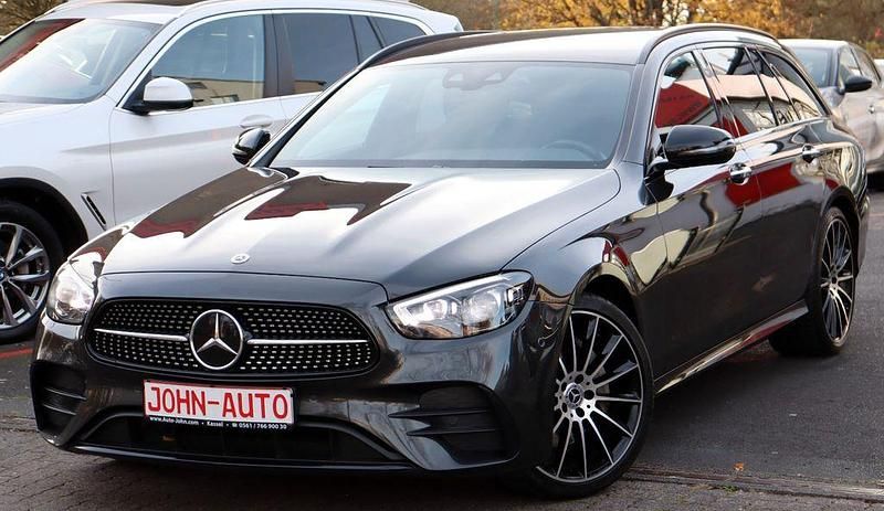Graphitgrau (metallic) Gebraucht 2021 Mercedes E220 AMG Kombi | 29.900 € (Fairer Preis) - Bild 1/4