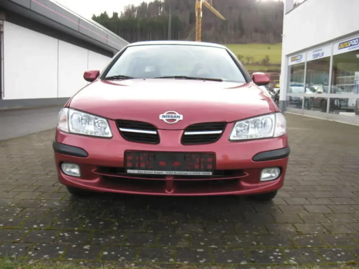 Gebraucht Nissan Almera 90 PS (66 kW) 2001 Rot Kleinwagen