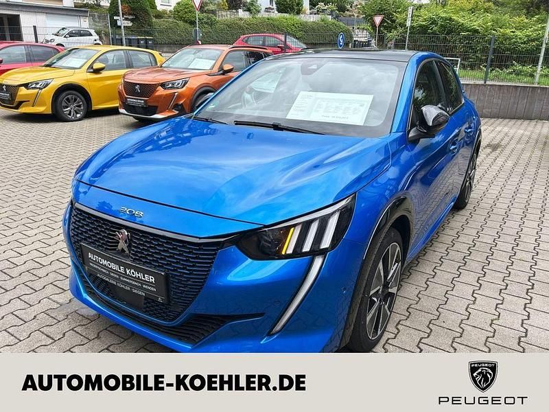 Blau Gebraucht 2022 Peugeot e-208 GT Kleinwagen | 20.850 € (Etwas zu teuer) - Bild 1/4