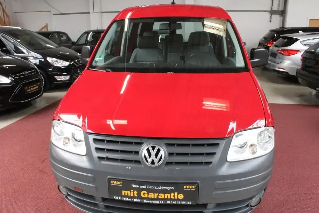 Używany VW Caddy 75 KM (55 kW) 2009 Czerwony Minivan