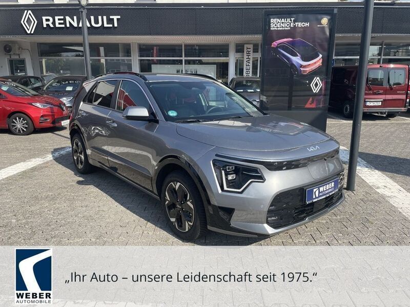 (klg) steel grey (grau) Gebraucht 2024 Kia e-Niro 2 SUV | 34.970 € (Teuer) - Bild 1/4