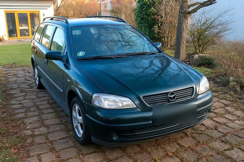 Grün Gebraucht 2001 Opel Astra Kombi | 1.200 € (Fairer Preis) - Bild 1/4