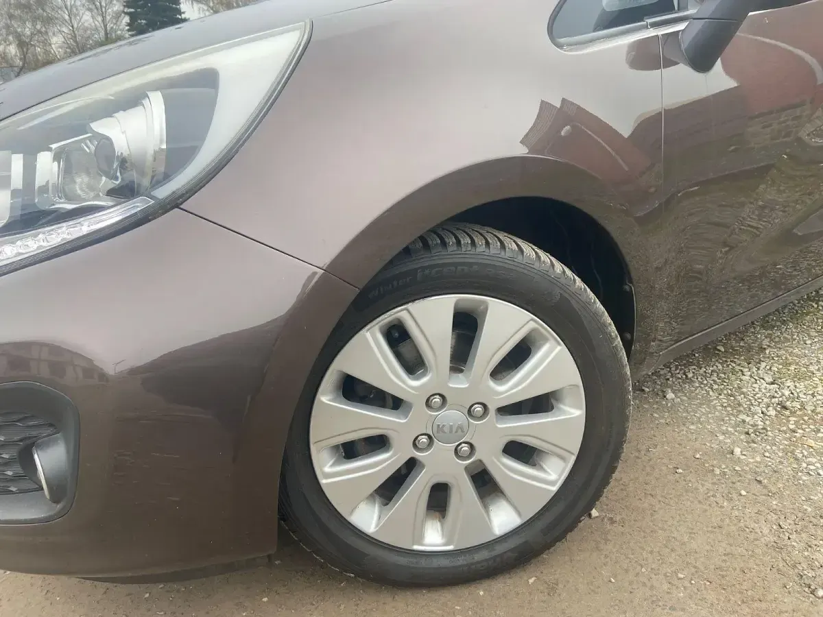 Używany Kia Rio Edition 7 109 KM (80 kW) 2012 Brązowy Sedan/Limuzyna