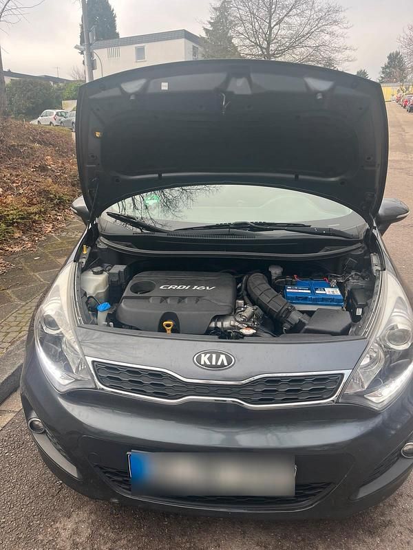 Gebraucht Kia Rio 90 PS (66 kW) 2014 Grau Kleinwagen