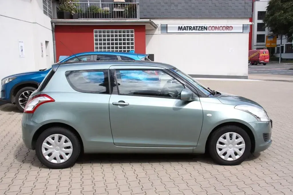 Gebraucht Suzuki Swift 94 PS (69 kW) 2011 Grün Kleinwagen