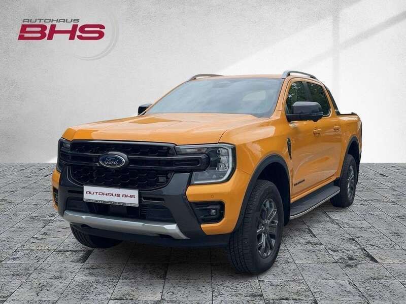 Cyber orange (orange) Gebraucht 2023 Ford Ranger Wildtrack Abholung | 47.950 € (Teuer) - Bild 1/4