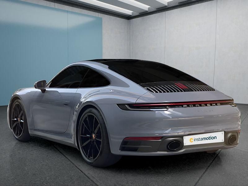 Grau Gebraucht 2024 Porsche 911 Carrera Coupé | 130.849 € (Etwas zu teuer) - Bild 1/4