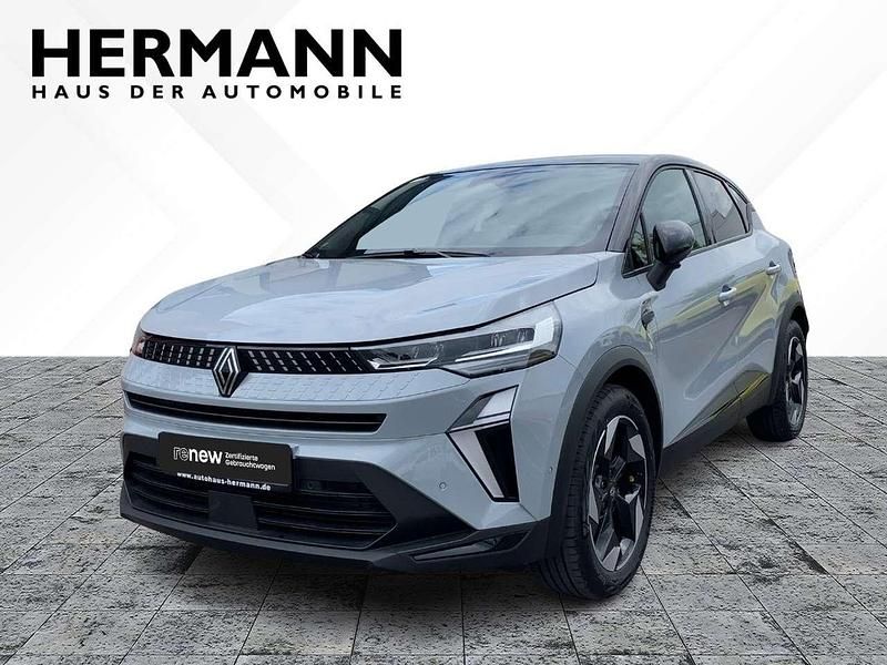 Rafalgrau metallic, black pea Gebraucht 2024 Renault Captur Techno SUV | 26.539 € (Etwas zu teuer) - Bild 1/4