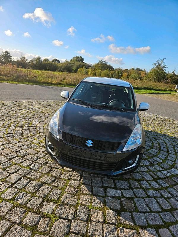 Schwarz Gebraucht 2014 Suzuki Swift Kleinwagen | 5.299 € - Bild 1/4