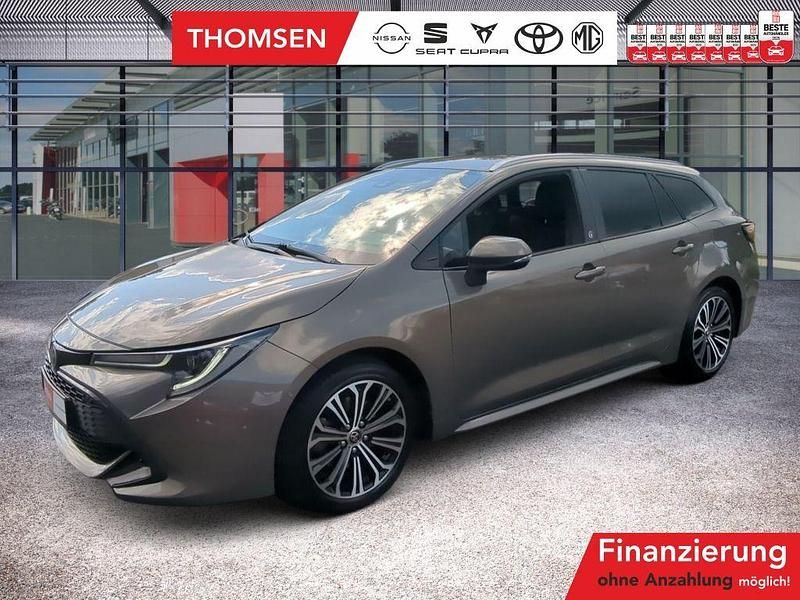 Manganbronze braun Gebraucht 2022 Toyota Corolla Team Kombi | 26.850 € (Fairer Preis) - Bild 1/3