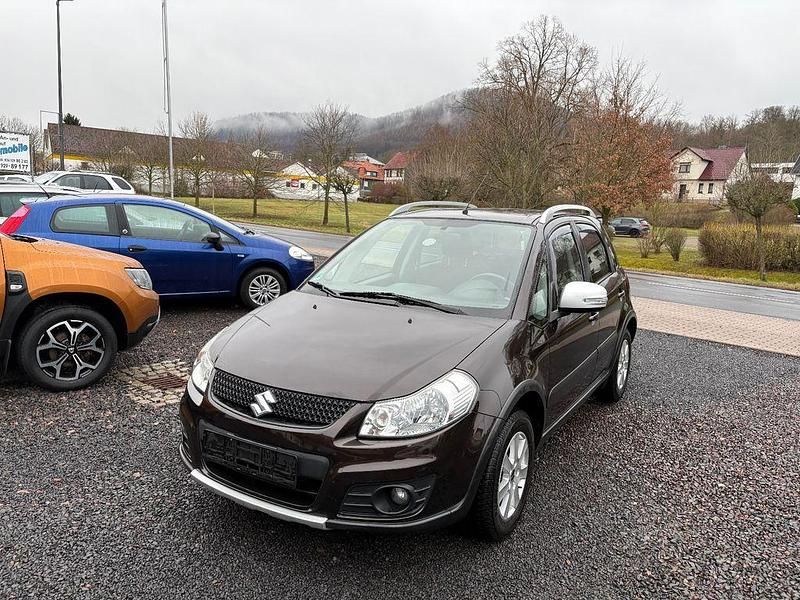 Braun Gebraucht 2014 Suzuki SX4 Style Limousine | 6.950 € (Teuer) - Bild 1/4