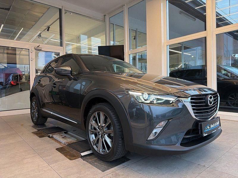 Matrixgrau metallic (metallic) Gebraucht 2018 Mazda CX-3 Kizoku Intense SUV | 17.950 € (Fairer Preis) - Bild 1/4