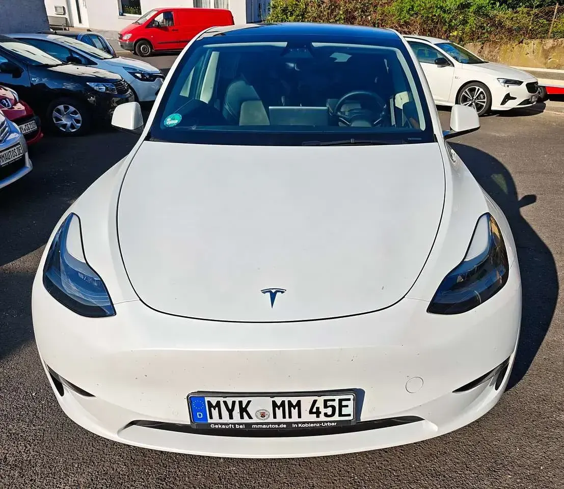 Gebraucht Tesla Model Y 378 kW (514 PS) 2023 Multicoat: pearl white SUV