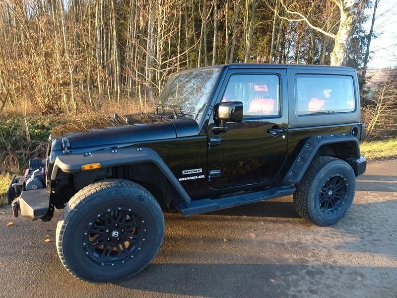 Schwarz Gebraucht 2013 Jeep Wrangler Sport SUV | 22.000 € (Fairer Preis) - Bild 1/4