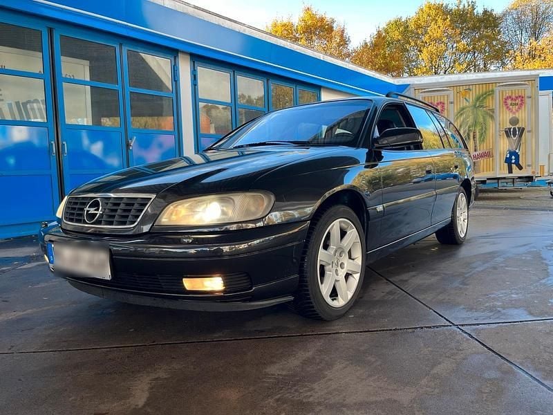 Schwarz Gebraucht 2001 Opel Omega Kombi | 3.590 € (Fairer Preis) - Bild 1/4