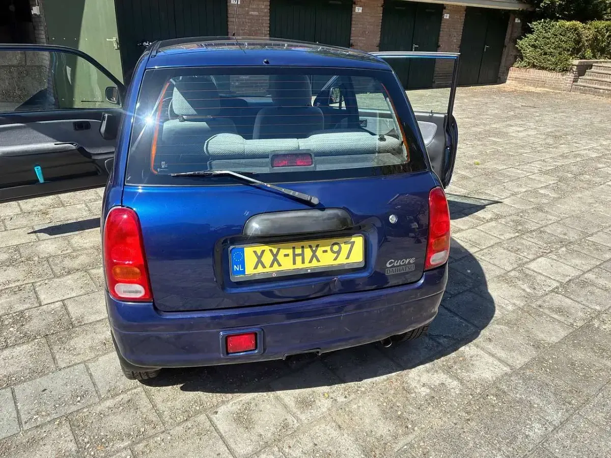 Gebraucht Daihatsu Cuore 56 PS (41 kW) 1999 Blau Kleinwagen