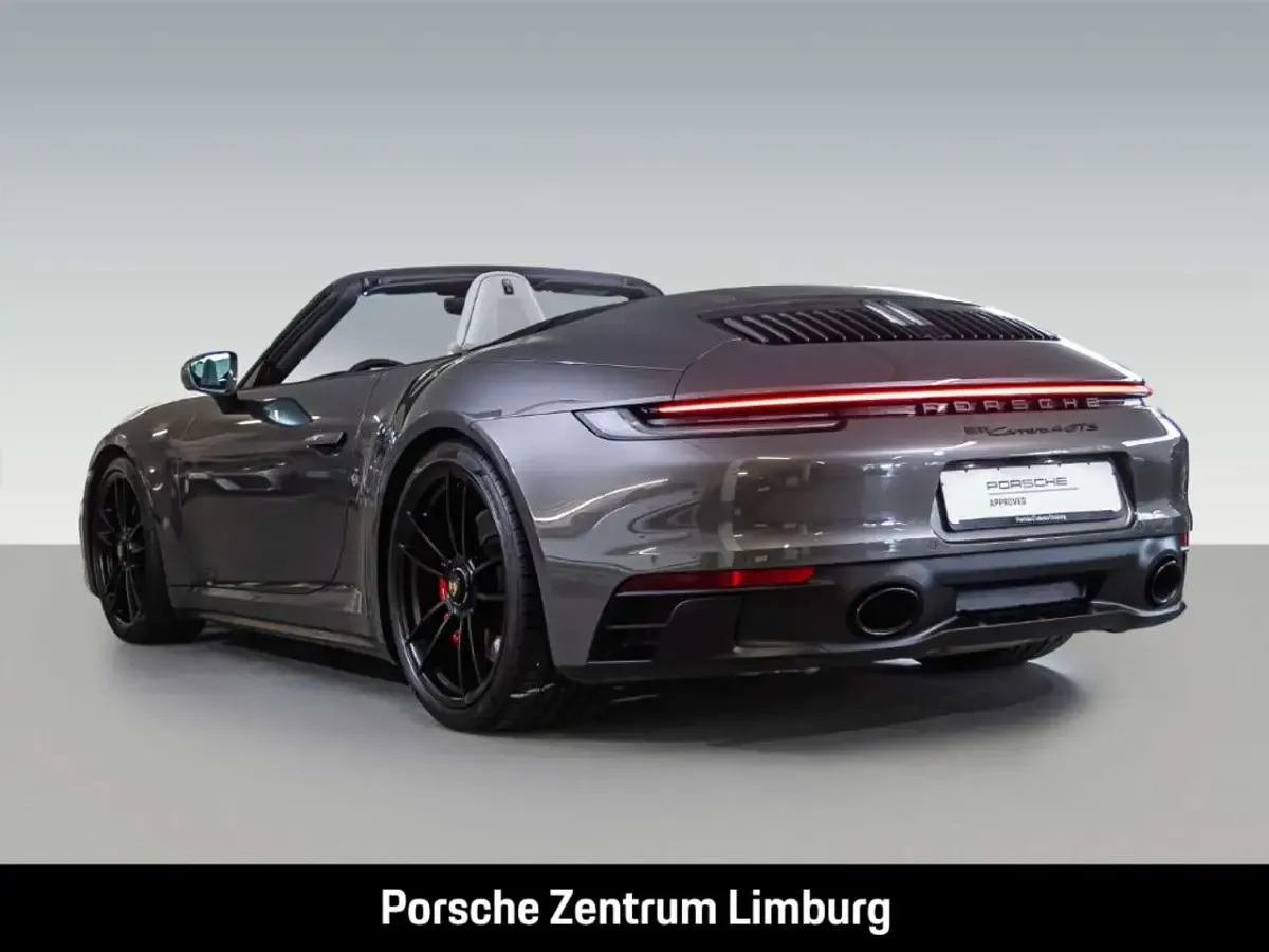 Gebraucht Porsche 911 480 PS (353 kW) 2024 Achatgraumetallic Cabrio
