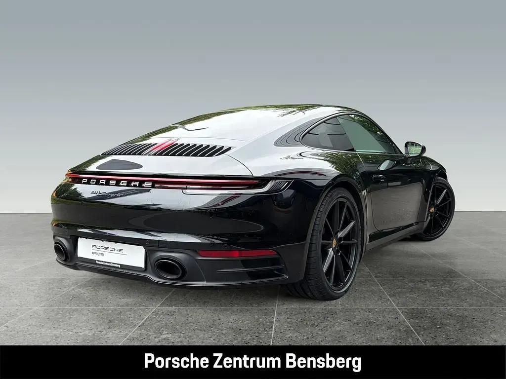 Gebraucht Porsche 911 Carrera 385 PS (283 kW) 2024 Schwarz Coupé