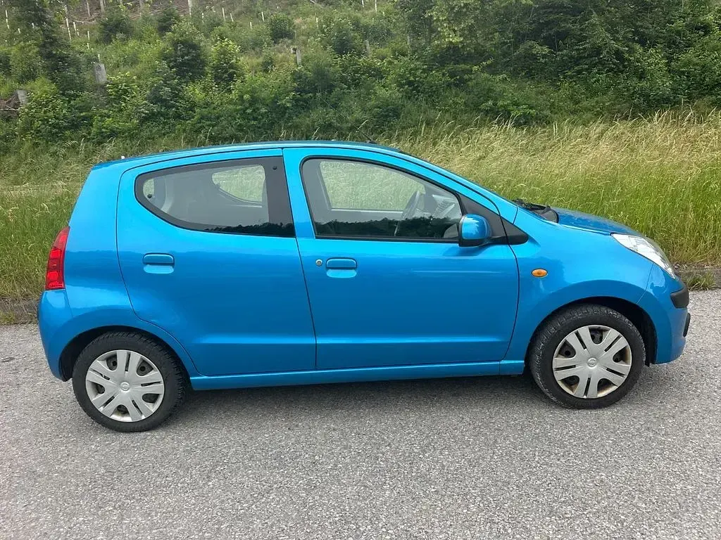 Gebraucht Nissan Pixo Acenta 68 PS (50 kW) 2011 Blau Kleinwagen